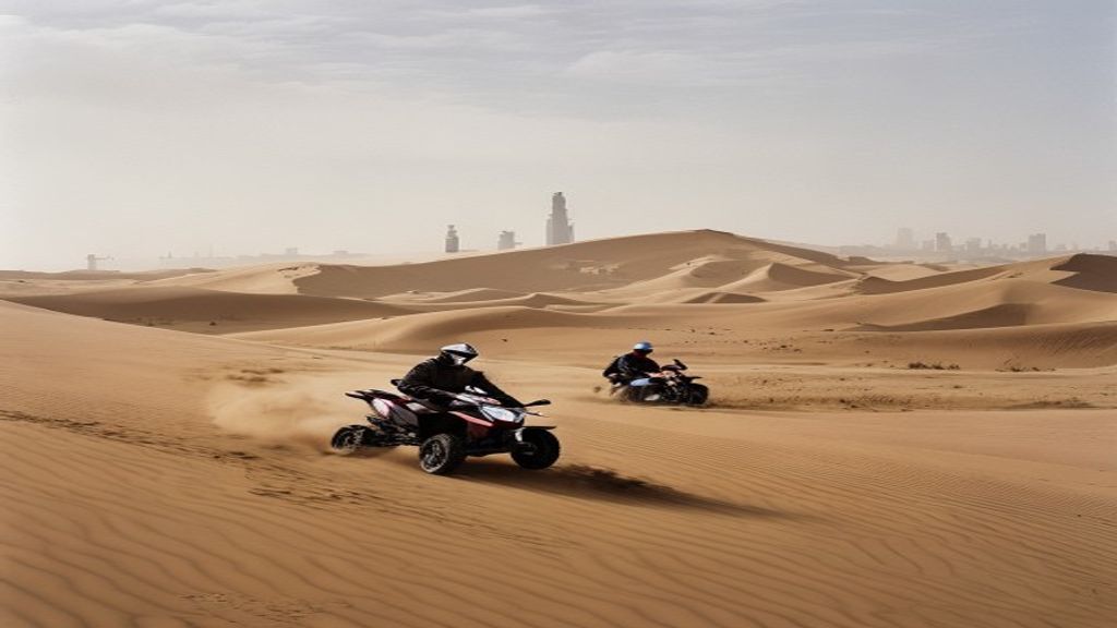 Quad bike on wide Abu Dhabi desert dunes near Al Khatim