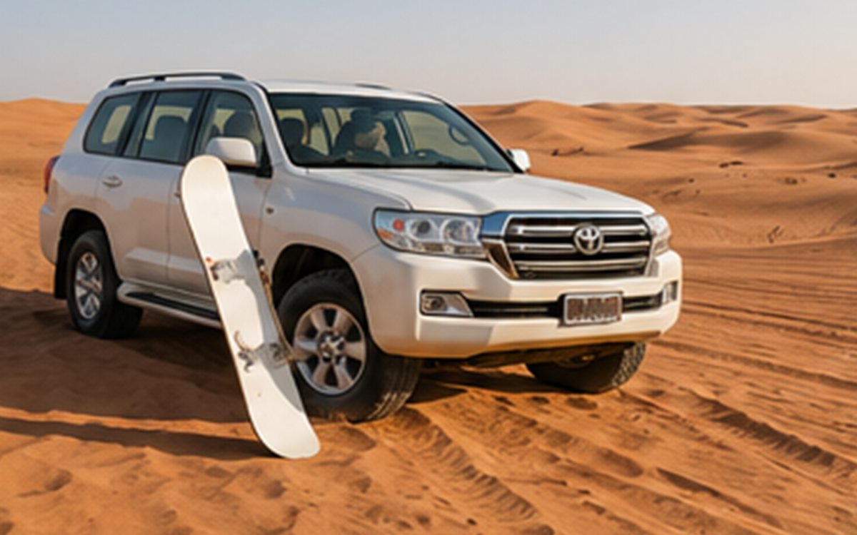 Morning desert safari Land Cruiser on red dunes