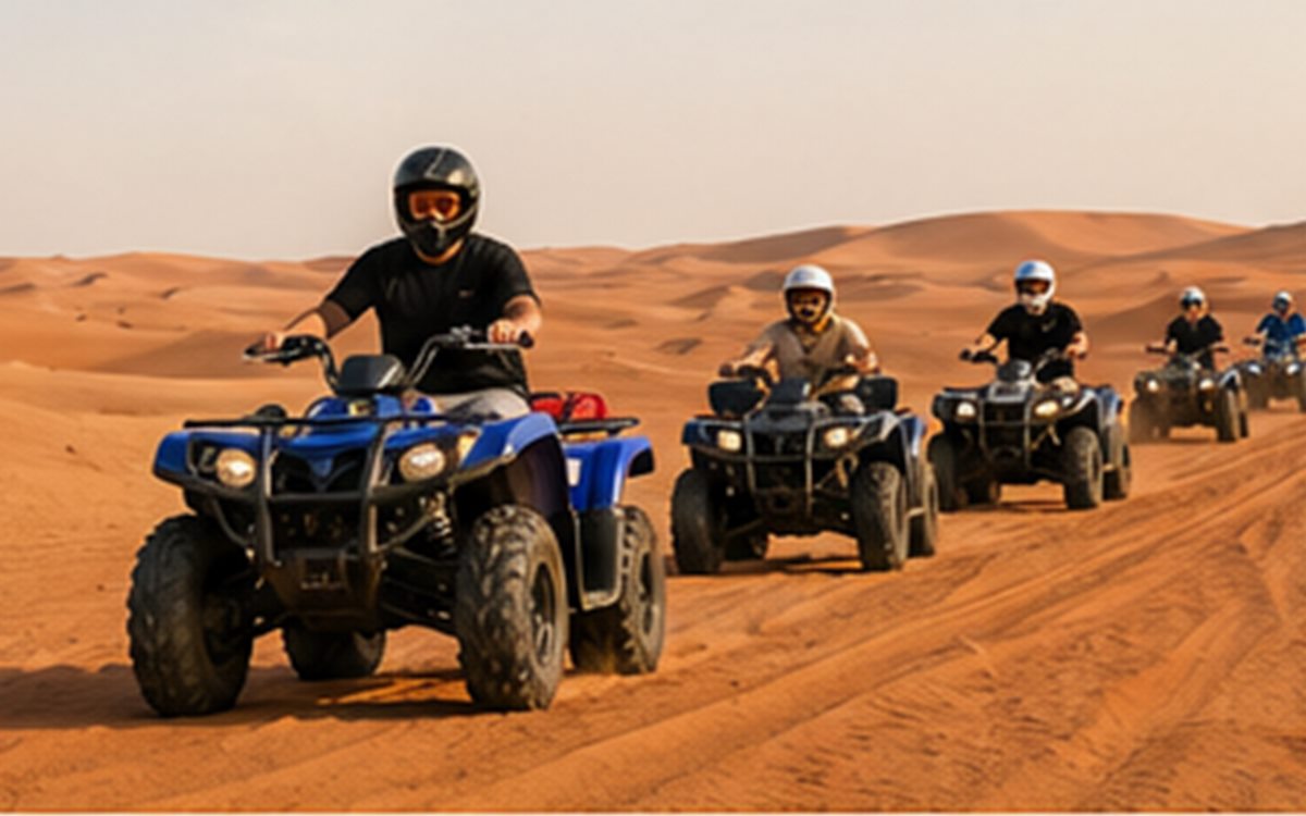 Quad bike riding across Dubai desert tracks