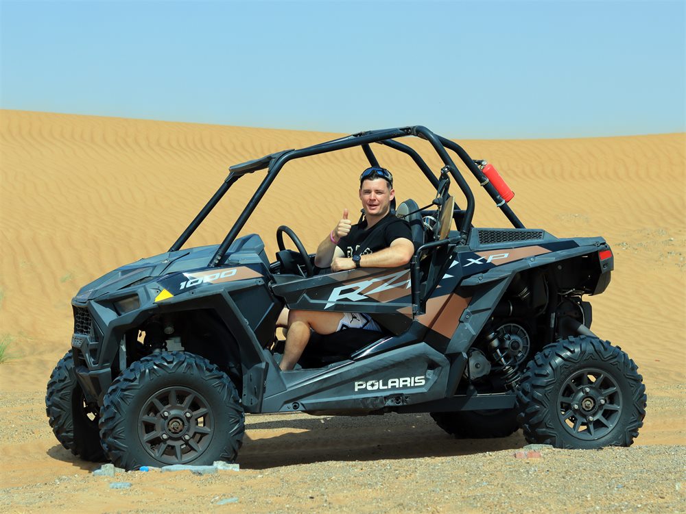 Dune buggy adventure on red dunes